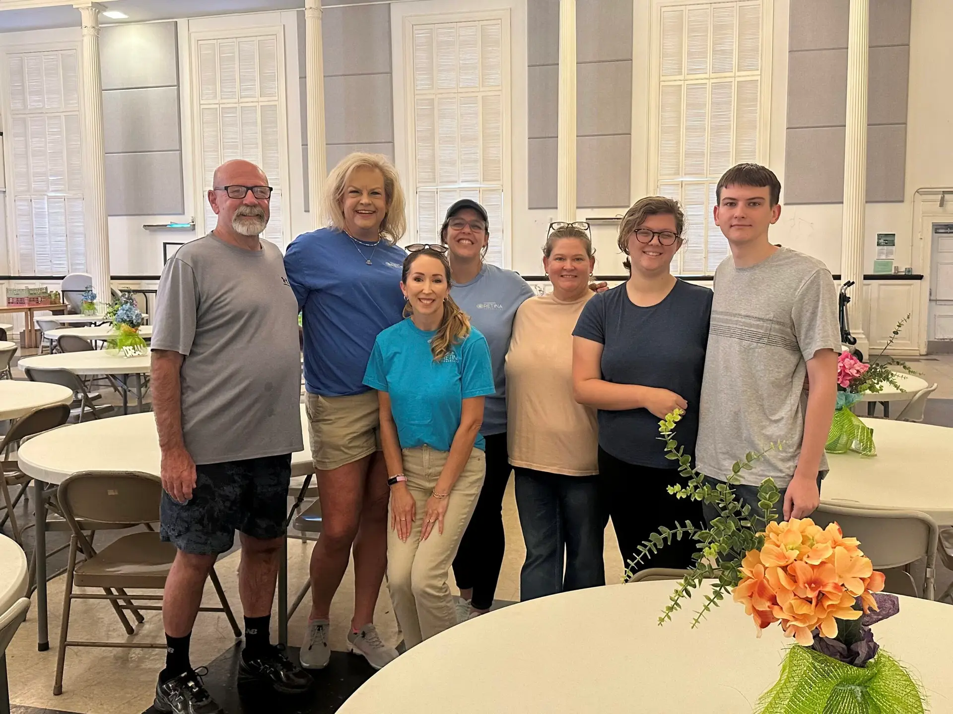 Mississippi Retina Associates employees and family members gather during their September 7 volunteer day at Stewpot Community Services.
